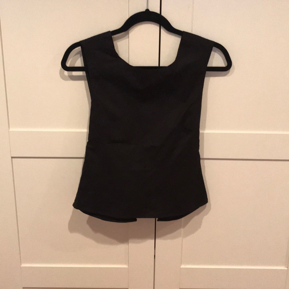 Black open back top with bow
